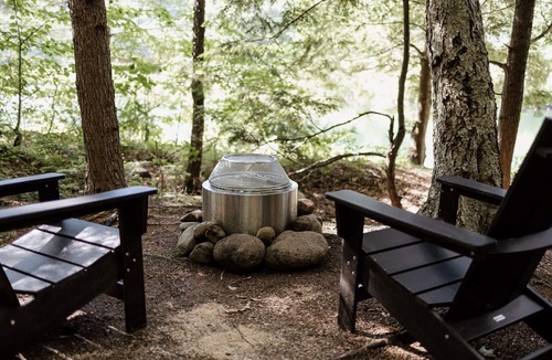 Grafton County RV Rental | Safari Tent Site 5 | 1 King Bed | Pond View