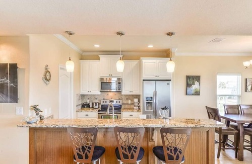 Pointe San Luis House | Sea Turtle Tango- Close to beach! Community Pool!