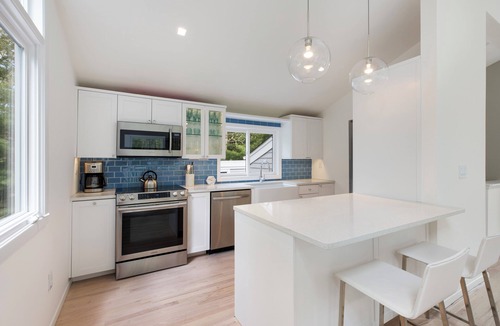 Northwest Harbor House | Serene East Hampton Retreat with Heated Pool. Walk to Sammy’s beach!
