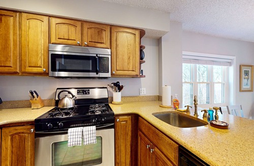 Ludlow Condo | Ski-in/out condo near lifts with a fireplace, pool, hot tub, & tennis