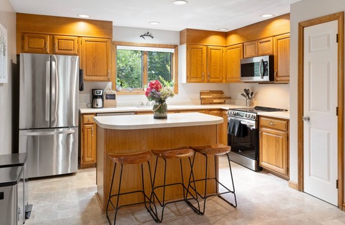 West Hartford House | Spacious dog-friendly home with two decks, fireplace, home office, pools & golf
