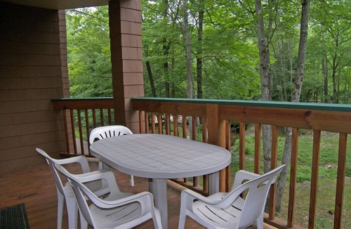 North Woodstock Condo | Spacious, fireplace, deck, river view, pool & fitness club. D0260 by LRS