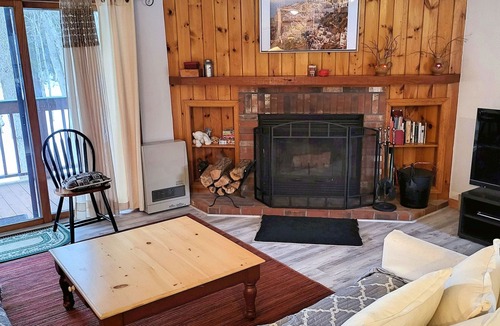 North Woodstock Condo | Spacious, fireplace, deck, river view, pool & fitness club. D0260 by LRS