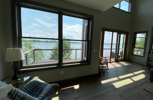 Alburg House | Spectacular Lakefront Home With Patio, Fire Pit, Large Dock and Work Booth.