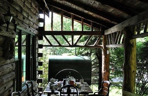 Andes House | Stunning, Secluded Log Home Surrounded by Woods and Water