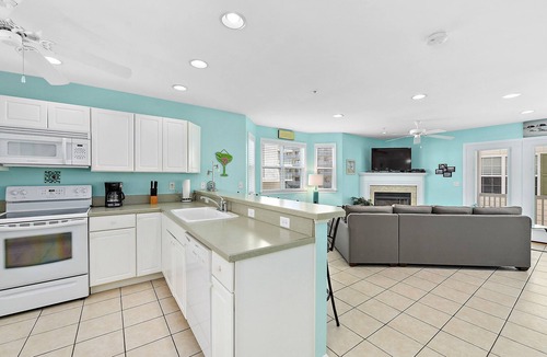 Midtown Ocean City House | Stylish, upscale 3 bedroom condo with a television in every bedroom and living room, free WiFi, and two floors located downtown only a few streets from the boardwalk and only steps to the beach!