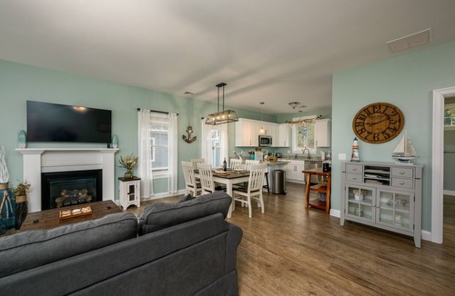 Arundel Cottage | Sunkissed cottage, resort amenities, heated pools, club house, close to beaches