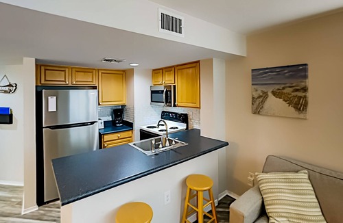 Fort Morgan Condo | Sunny renovated condo with private beach access, pools, hot tub, tennis & gym
