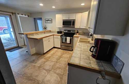 Swain Apartment | Swain Hill Hideaway offers beautiful ski area view. Accommodates 4 guests.