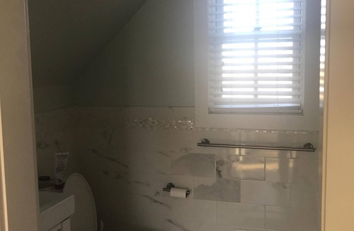 South Kingstown House | Tranquil 2-bedroom guest suite steps from a private beach. Sleeps four max.