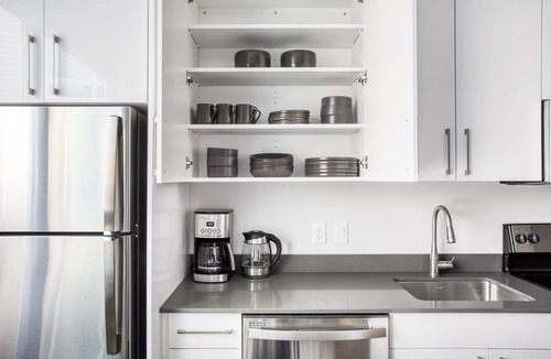 St. Elizabeth's Apartment | Trendy Brighton Studio w/W/D, Gym, near T, Shops + Dining, by Blueground