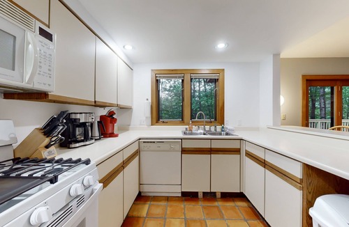 Ludlow Condo | Two-story condo with forest views, Echo Lake beach access, pool, dock & tennis
