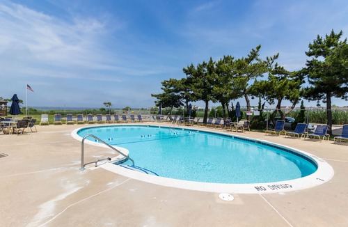 North Ocean City Condo | Updated coastal getaway with pool - walk to beach, dining, shops & entertainment