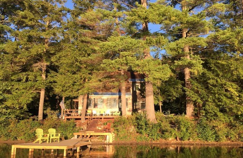 Sunapee House | Waterfront Vacation Home For Up To 5 Guests. Canoe, Swim, Ski, and Have Fun.