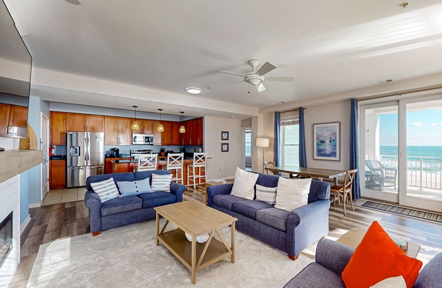 Beachfront 2nd-floor condo with ocean views, balcony, 3 pools & gym