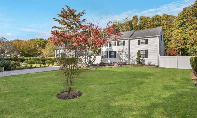 Greenport West House | Colonial-Style Home on 0.48 Acres, Spacious Living and Entertaining Areas,...