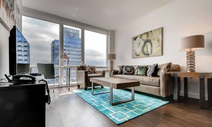 Hell's Kitchen Apartment | Deluxe 2BR | Full Kitchen & Premium Linens | Midtown West by GLS