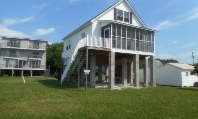 Chincoteague House | Great Water Views in quiet pet-friendly location facing lighthouse. Large Yard