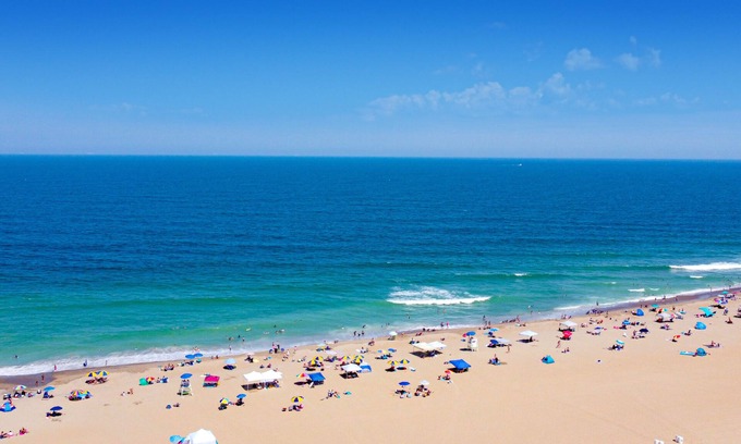 Sandbridge Condo | Luxe, 2-story condo with ocean views, balcony, fast WiFi & on-site pool/gym