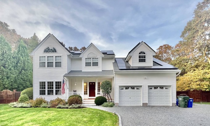 Westhampton House | NEW DECK! Private 1 Acre Family Friendly Home - Heated Pool, Home Office & Gym