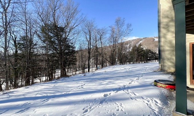 Ludlow Condo | Ski-in/out condo near lifts with a fireplace, pool, hot tub, & tennis