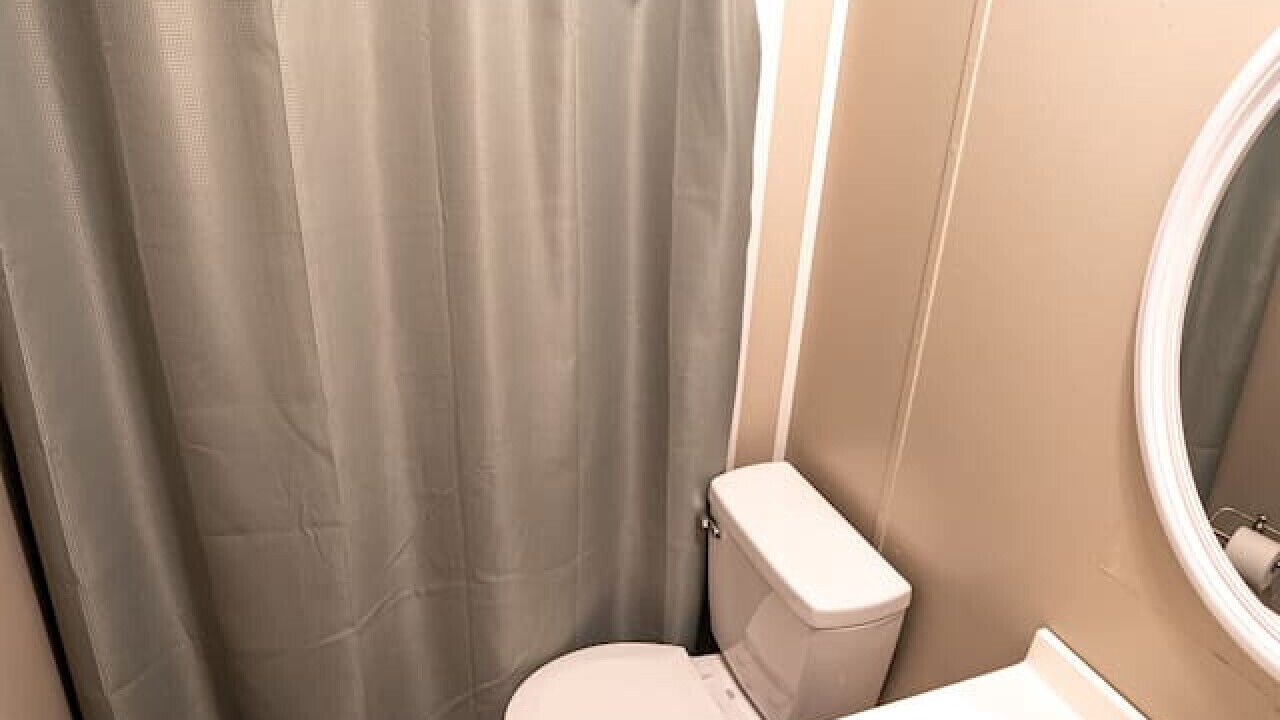 Photo of Bathroom in Red Jacket